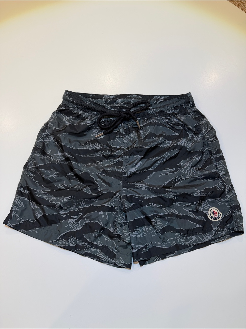 Moncler men’s Black and Gray Camouflage bathing suit. Size M